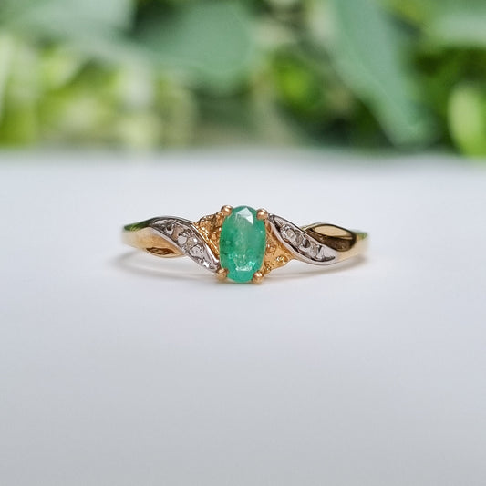 Vintage Oval Cut Emerald and Diamond Ring in 9ct Yellow Gold